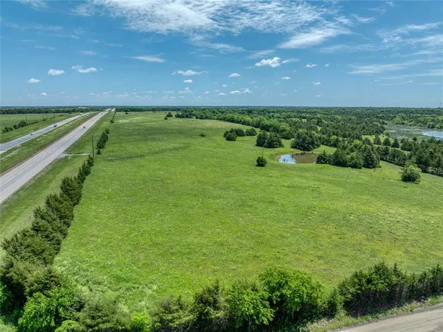 a lush green field with lots of green space