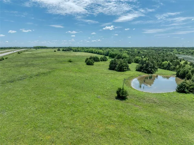 a view of a golf course with a garden