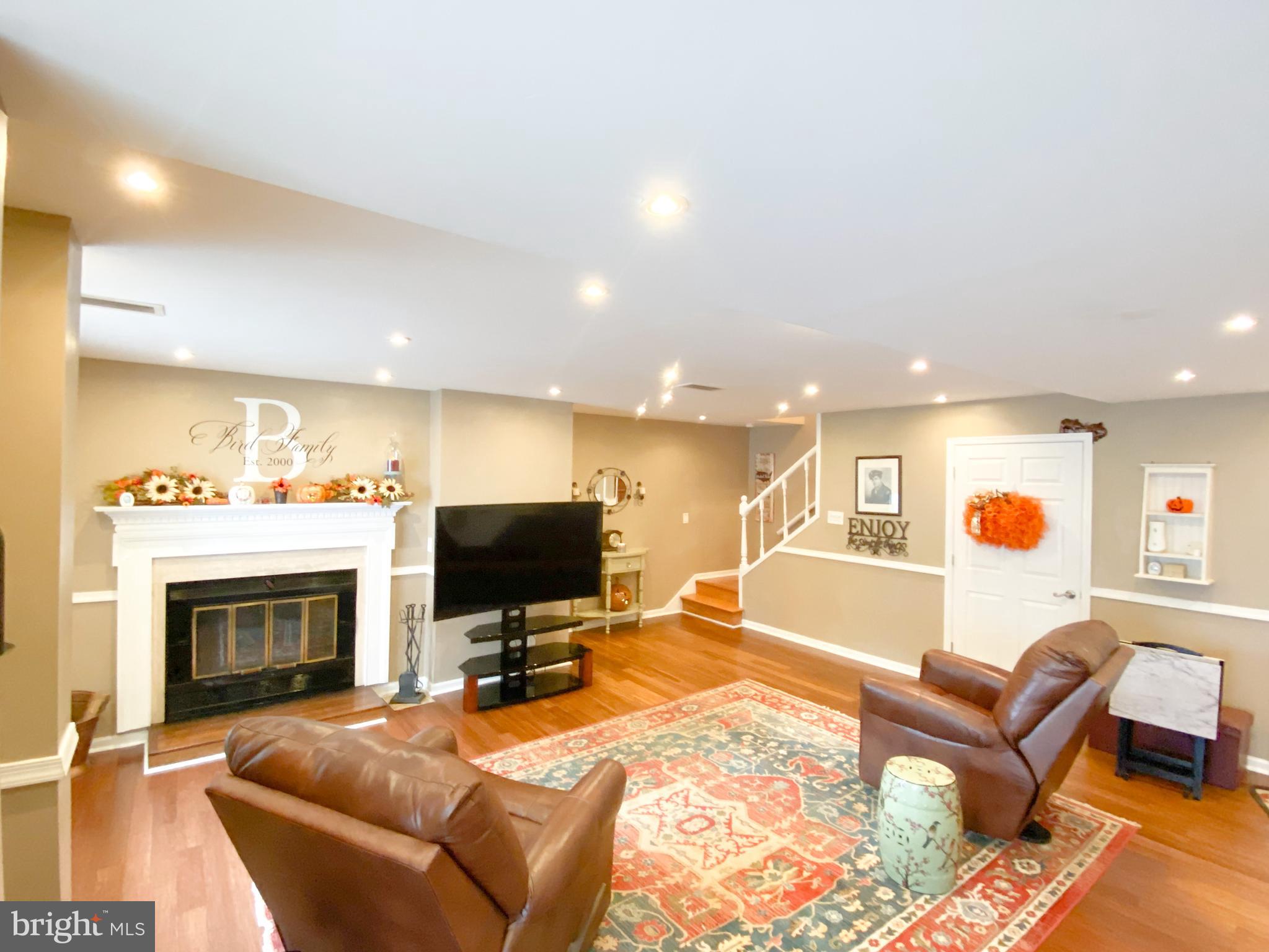 11 Remington Road Port Deposit, MD 21904 - Photo 5 of 37 a living room with furniture flat screen tv and a fireplace
