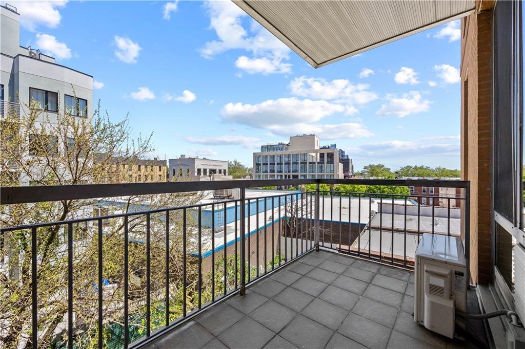 a view of city from a balcony
