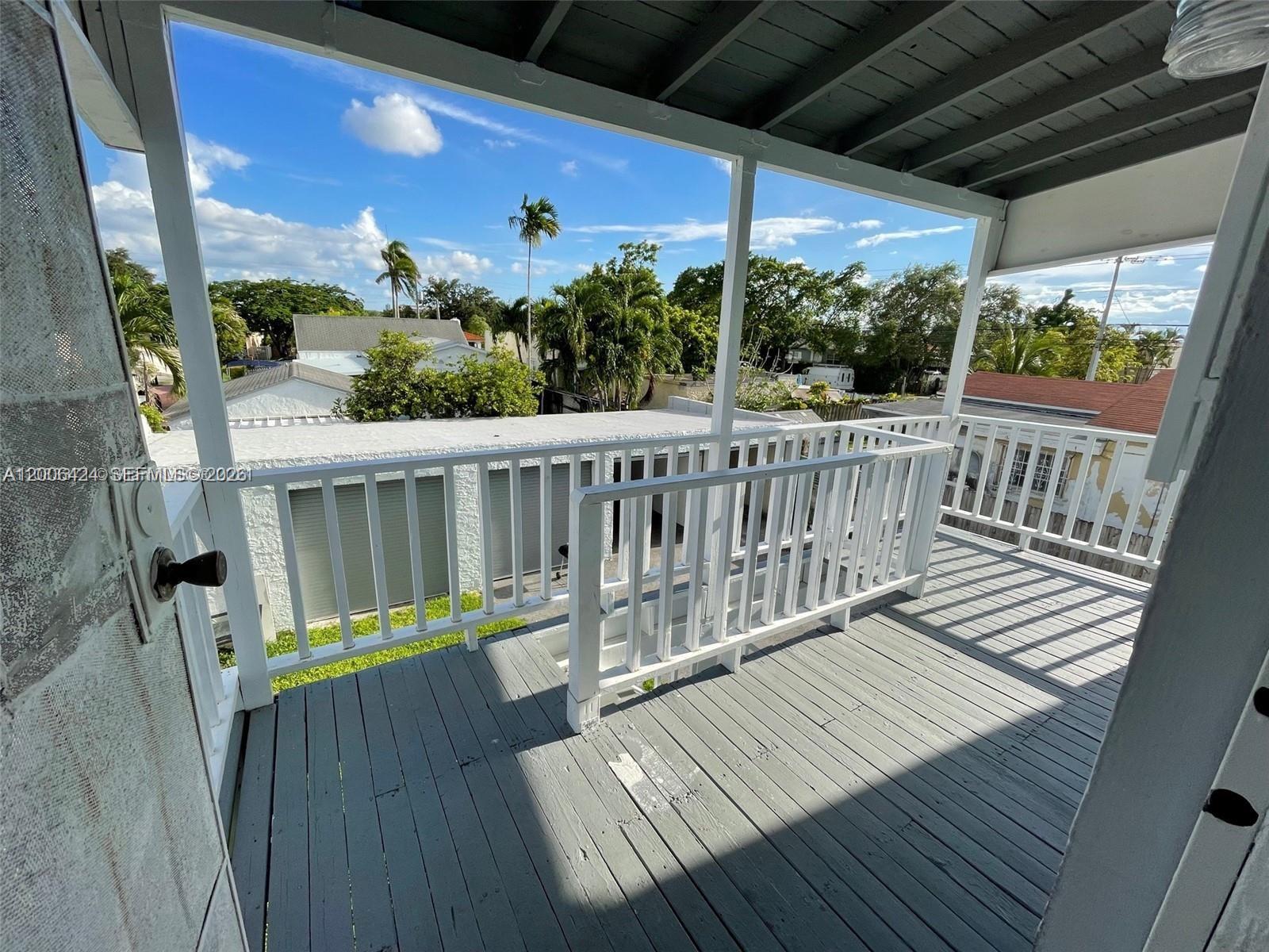 3364 Southwest 2nd Street, Unit 4 Miami, FL 33135 - Photo 13 of 14 a view of a wooden deck