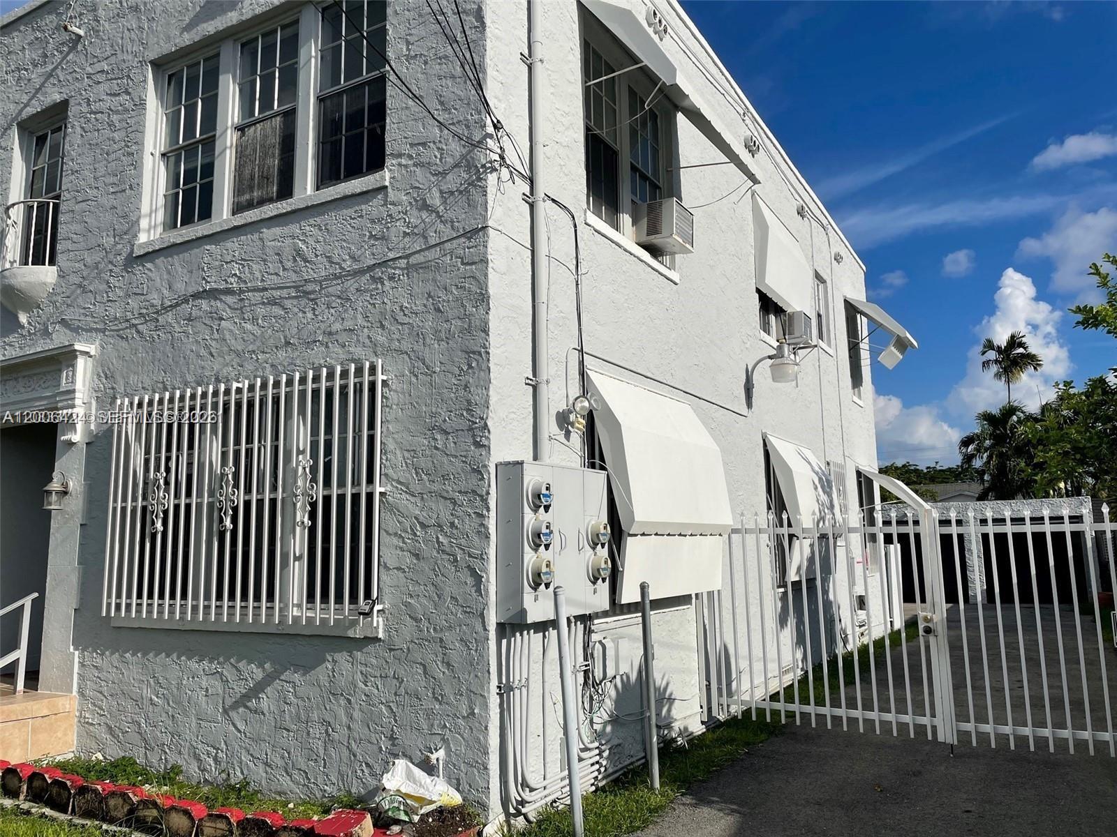 3364 Southwest 2nd Street, Unit 4 Miami, FL 33135 - Photo 14 of 14 a view of a house with stairs