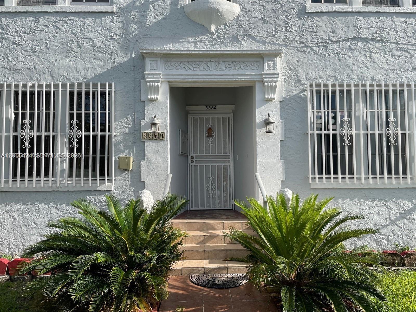3364 Southwest 2nd Street, Unit 4 Miami, FL 33135 - Photo 2 of 14 a front view of a house