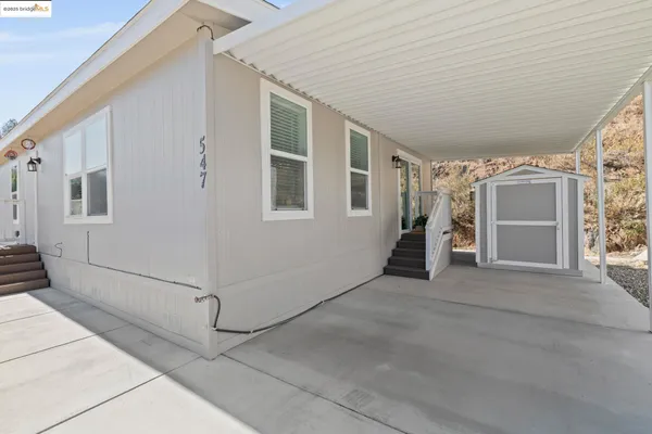 a view of a house with a garage