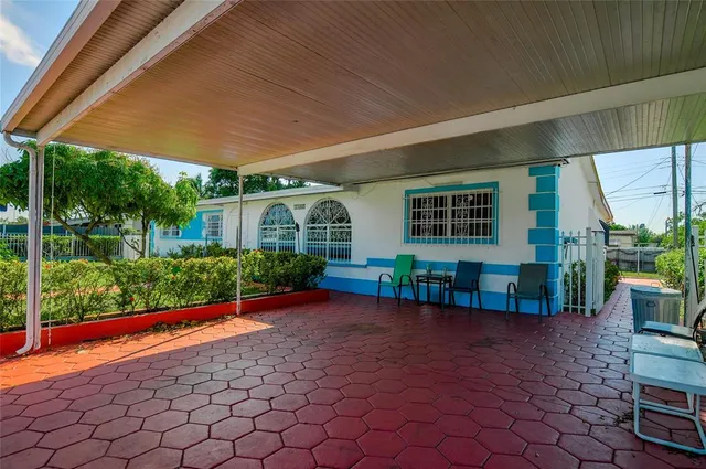 a view of a porch with a backyard
