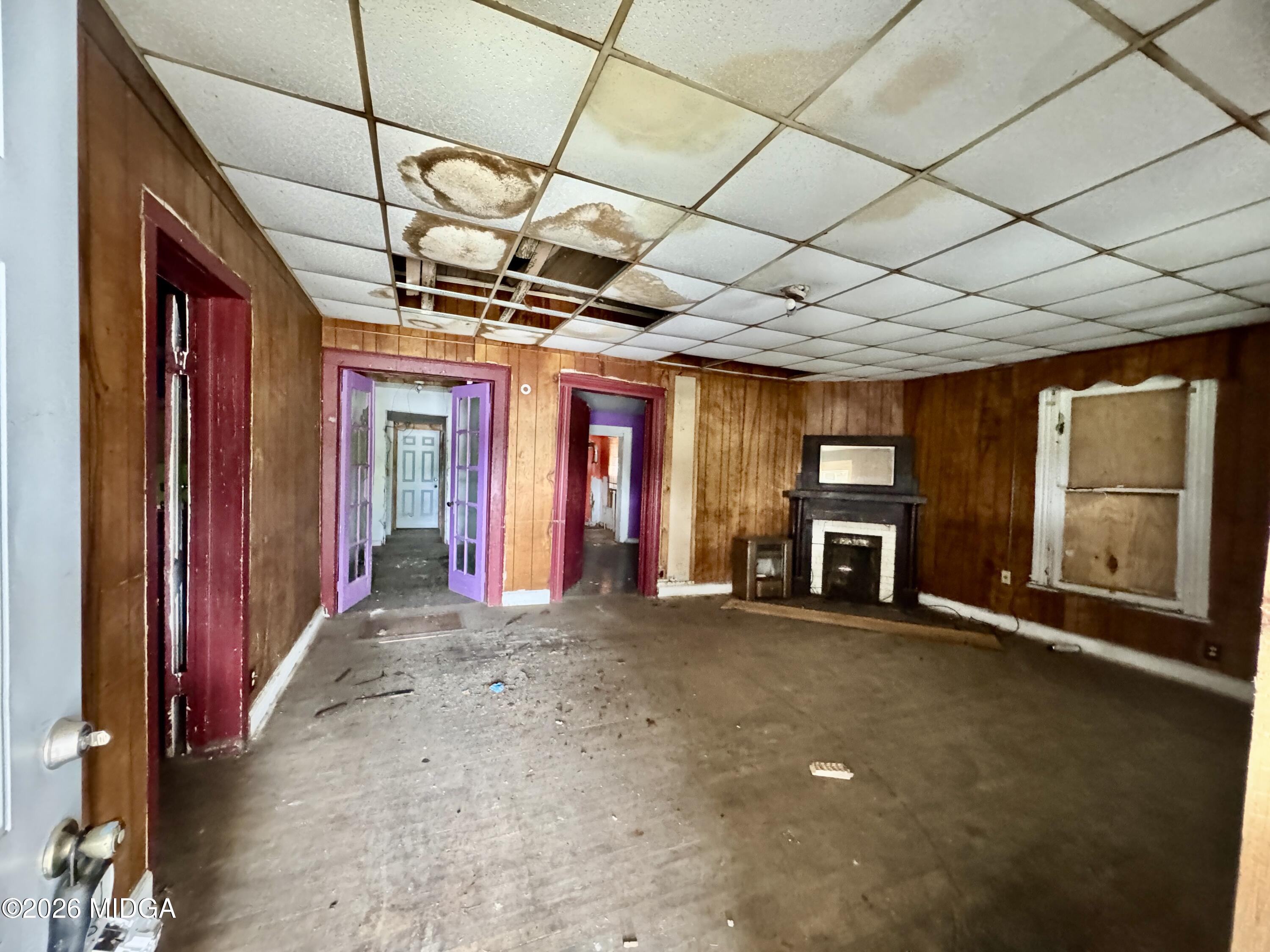 1905 3rd Avenue Macon, GA 31201 - Photo 16 of 27 a view of a room with wooden walls