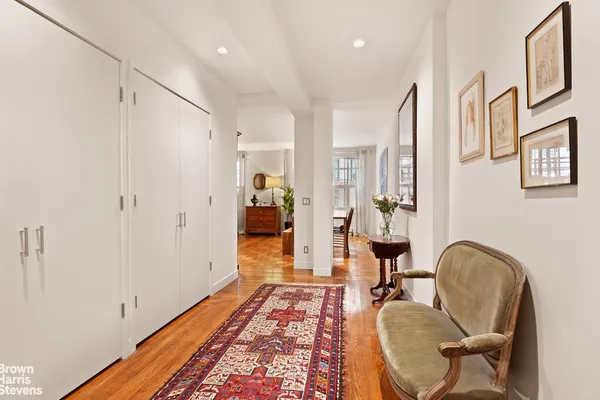 a living room with furniture and a rug