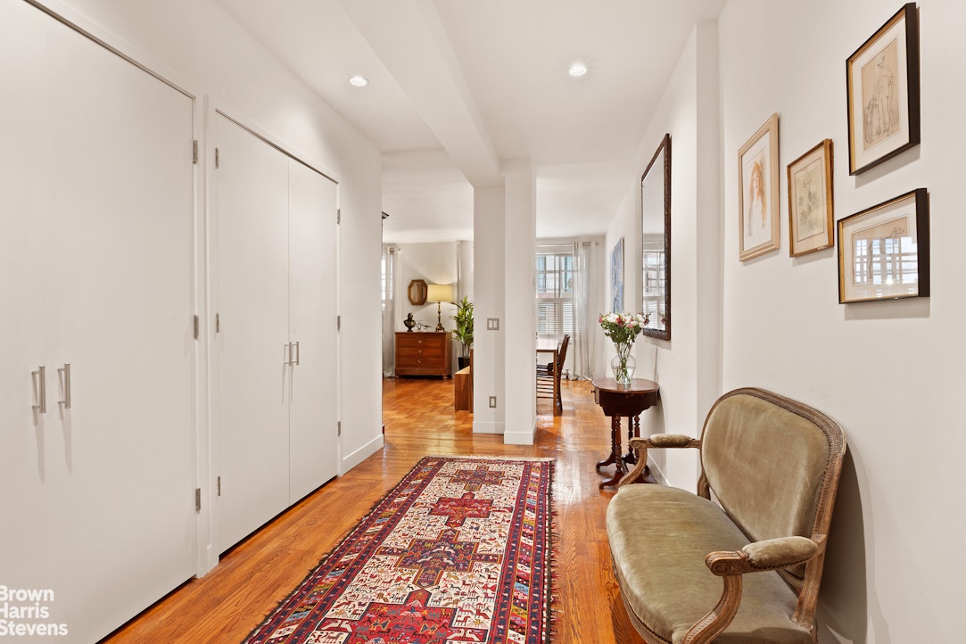 135 East 39th Street, Unit 1CD Manhattan, NY 10016 - Photo 3 of 11 a very nice looking room with wooden floor