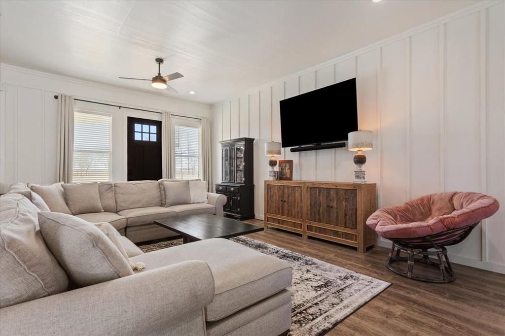 1652 Mt Moriah Road Riesel, TX 76682 - Photo 17 of 40 a living room with furniture and a flat screen tv