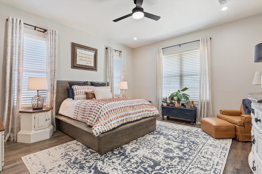 1652 Mt Moriah Road Riesel, TX 76682 - Photo 20 of 40 a bedroom with a bed and wooden floor