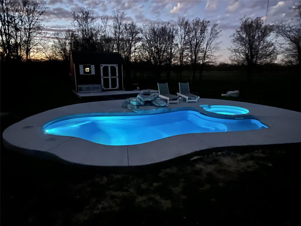 1652 Mt Moriah Road Riesel, TX 76682 - Photo 34 of 40 a view of a swimming pool with an outdoor space