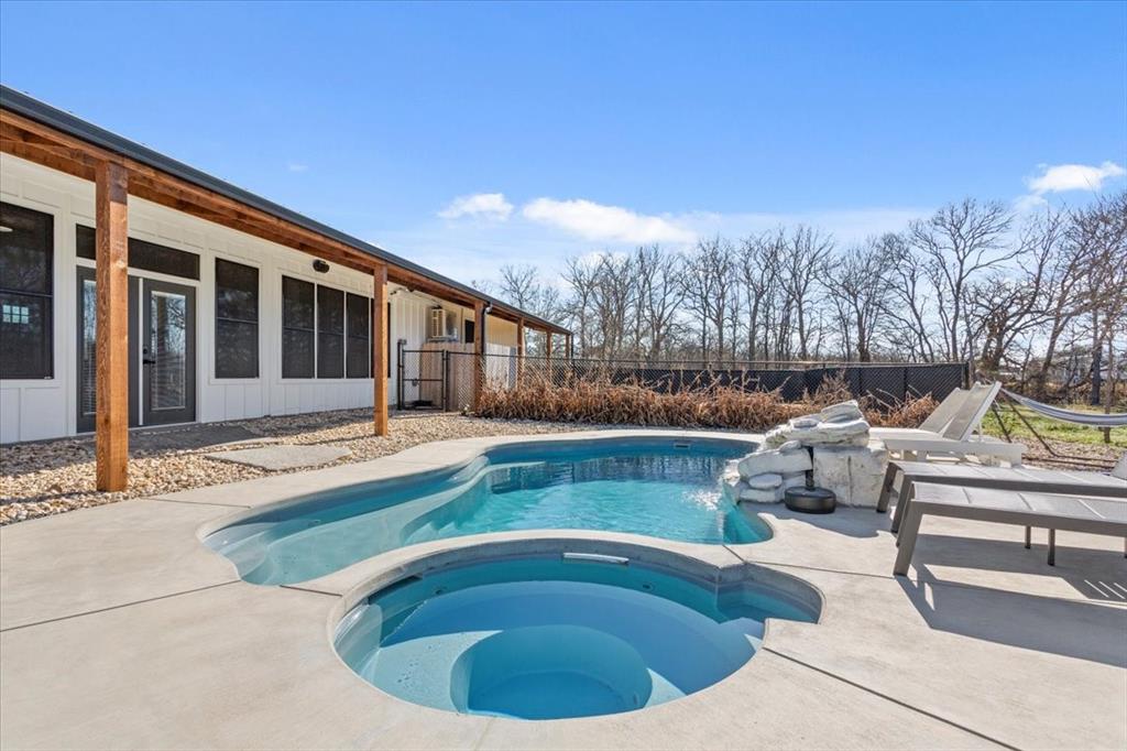 1652 Mt Moriah Road Riesel, TX 76682 - Photo 35 of 40 a view of a house with swimming pool and sitting area