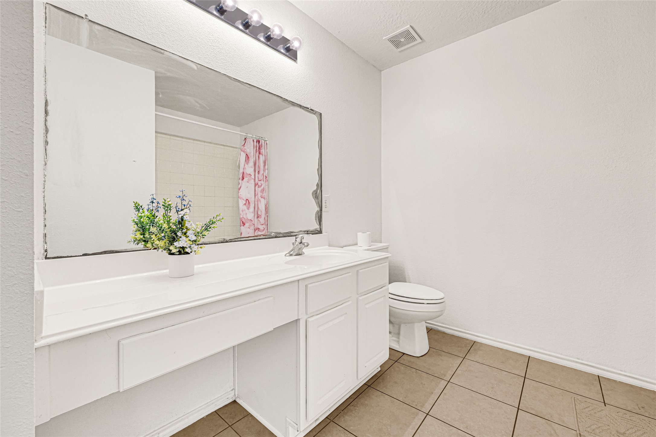 2911 Aspen Fair Trail Spring, TX 77389 - Photo 21 of 24 a bathroom with a toilet sink and mirror