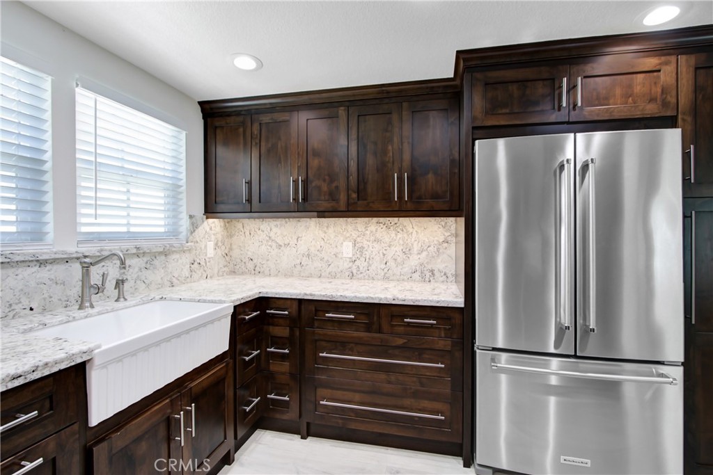 2166 Malati Circle Upland, CA 91784 - Photo 12 of 40 a kitchen with a refrigerator and a sink