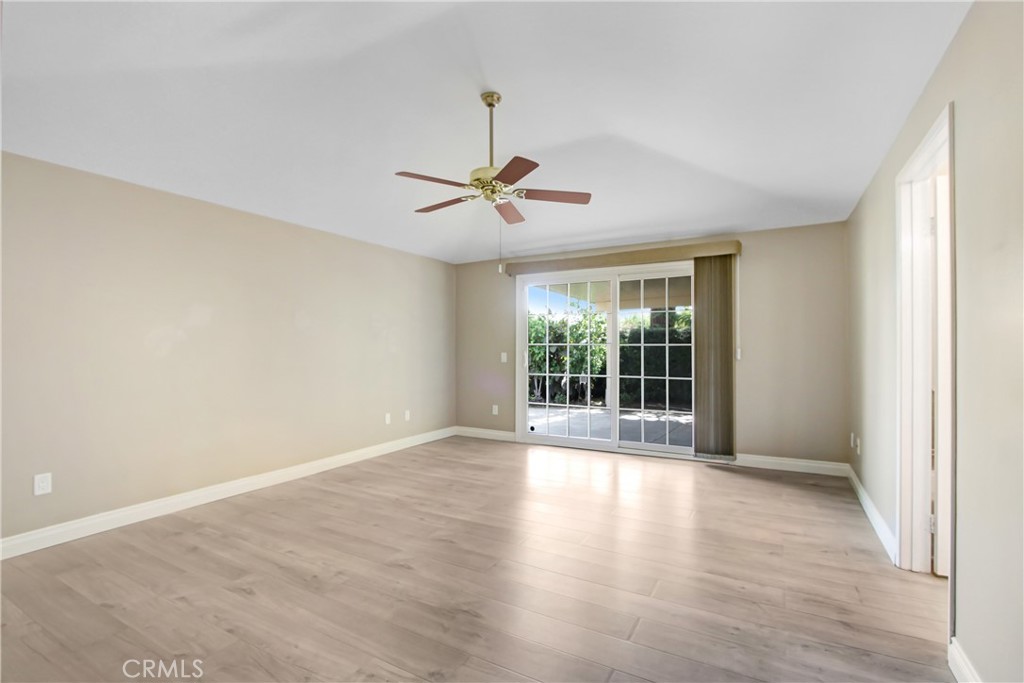 2166 Malati Circle Upland, CA 91784 - Photo 18 of 40 wooden floor in an empty room with a window