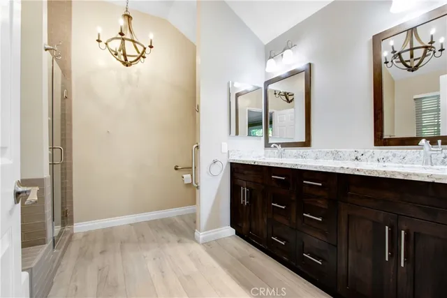 a bathroom with a bathtub and shower