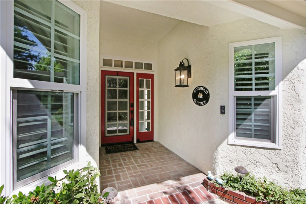 2166 Malati Circle Upland, CA 91784 - Photo 2 of 40 a front view of a house with a yard