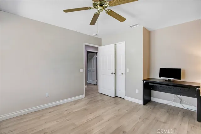a bathroom with a sink a vanity and a mirror