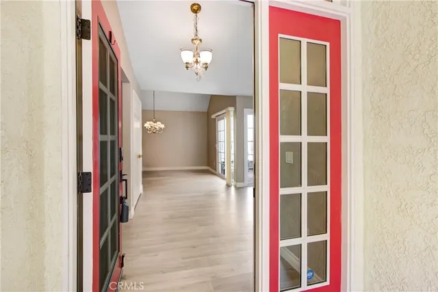 a view of a glass door and a window