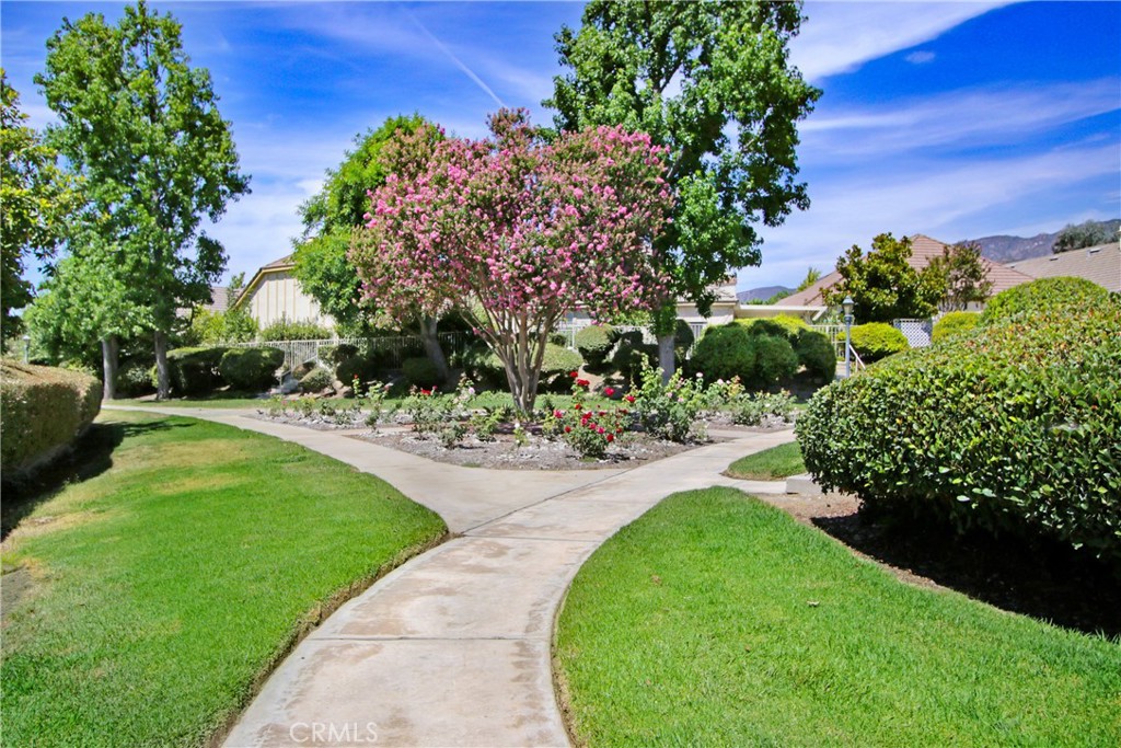 2166 Malati Circle Upland, CA 91784 - Photo 35 of 40 a view of a garden with a fountain