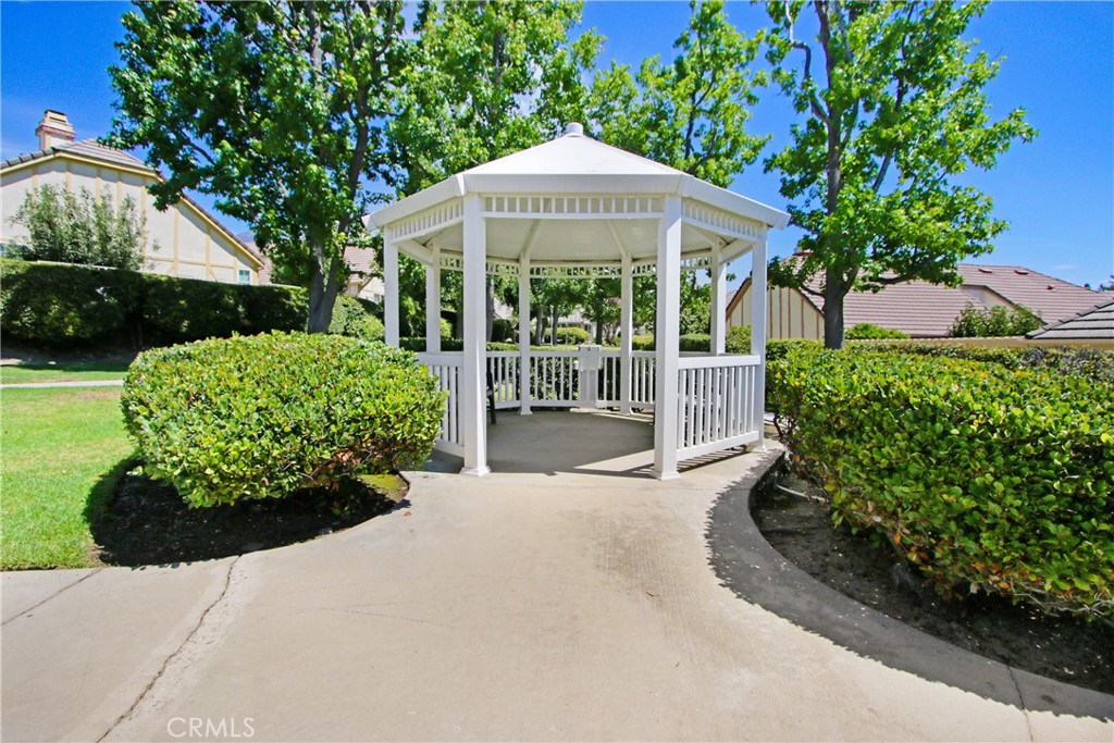 2166 Malati Circle Upland, CA 91784 - Photo 38 of 40 a front view of a house with a garden