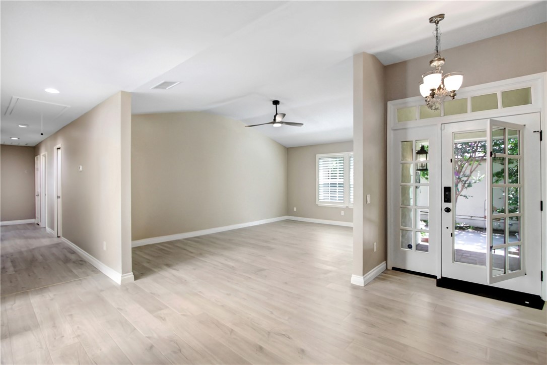 2166 Malati Circle Upland, CA 91784 - Photo 5 of 40 a view of a big room with wooden floor and windows