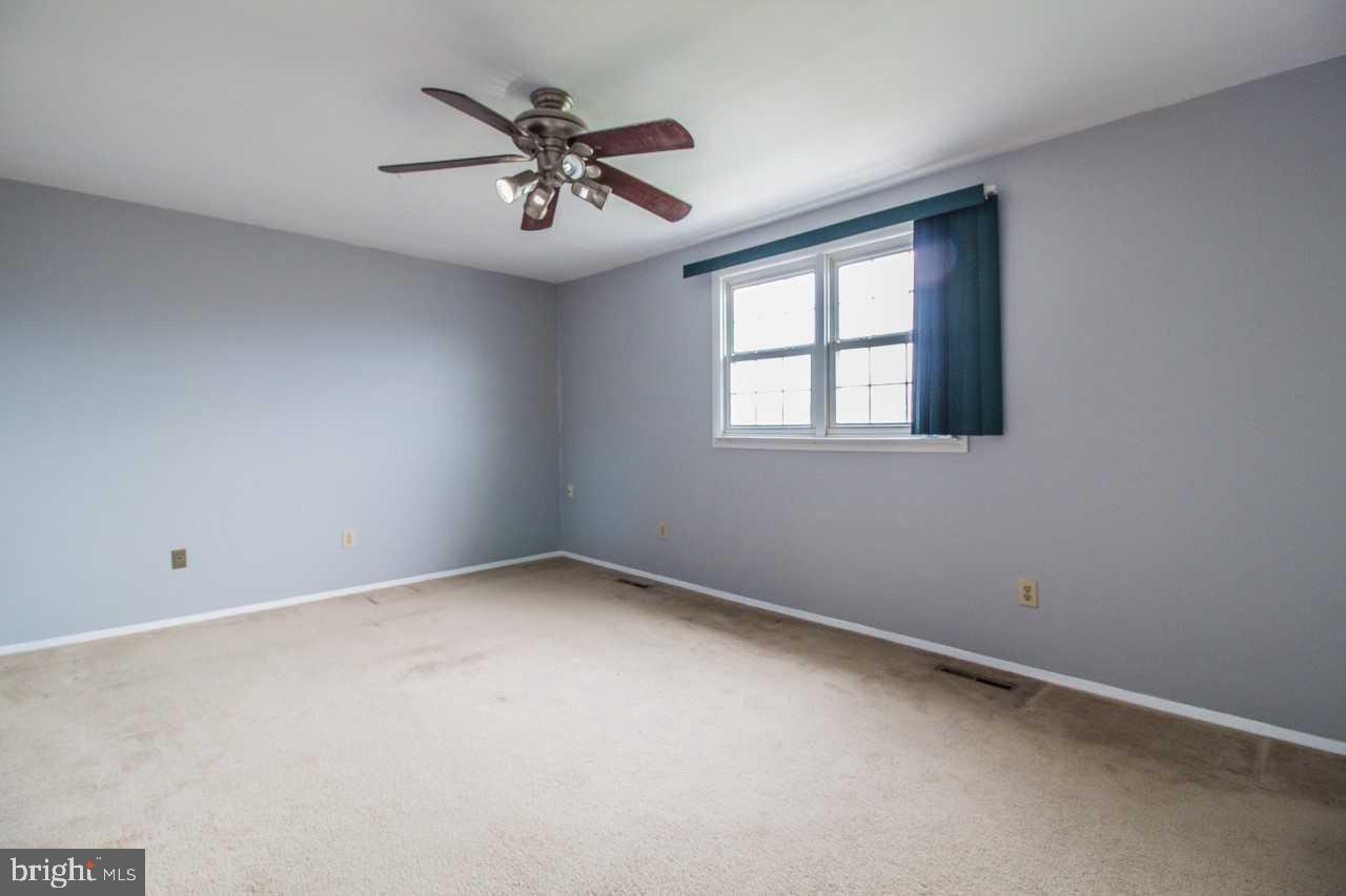 3941 Bayville Road Baltimore, MD 21220 - Photo 17 of 32 a view of an empty room with a window