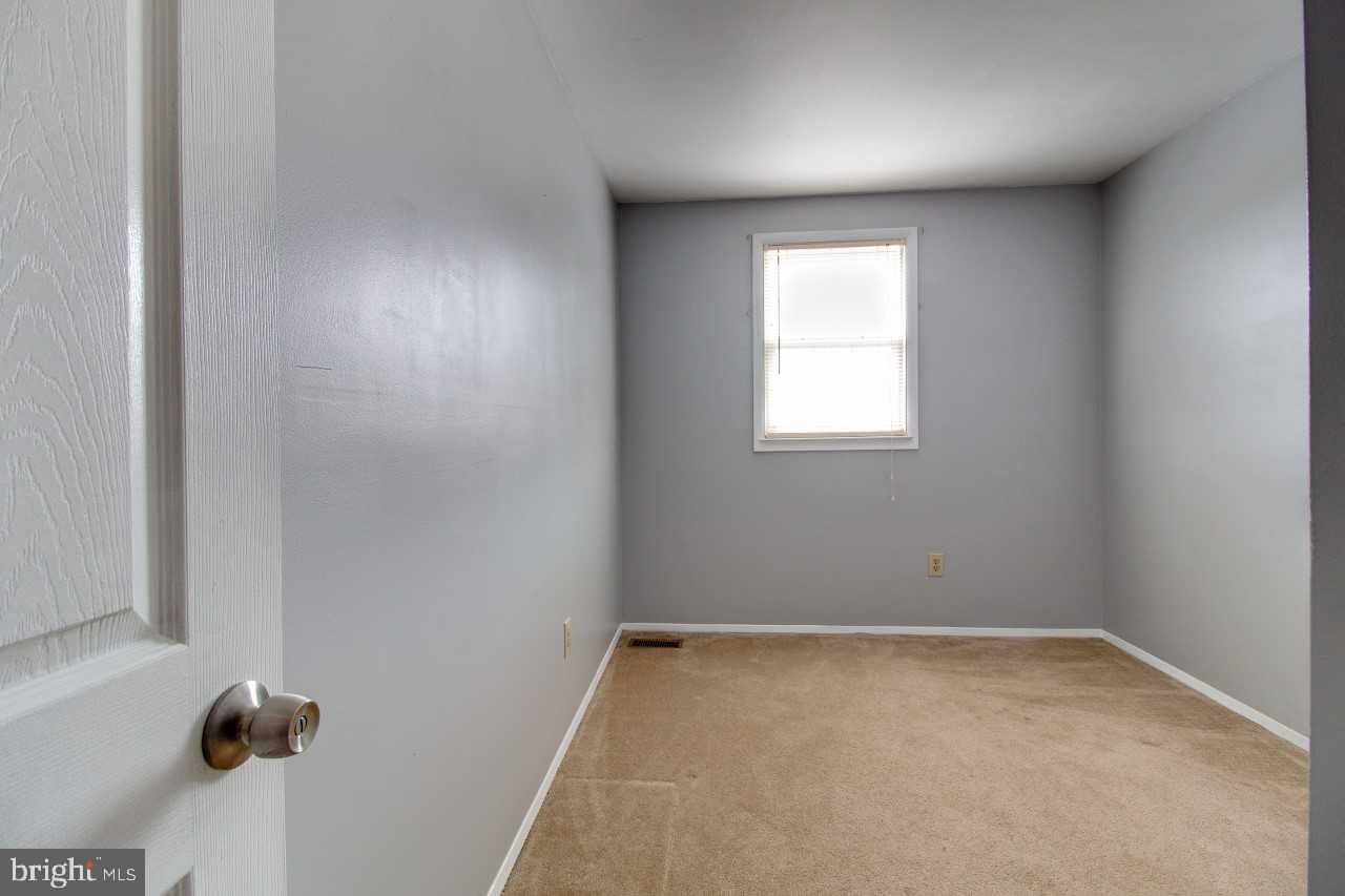 3941 Bayville Road Baltimore, MD 21220 - Photo 22 of 32 an empty room with a window