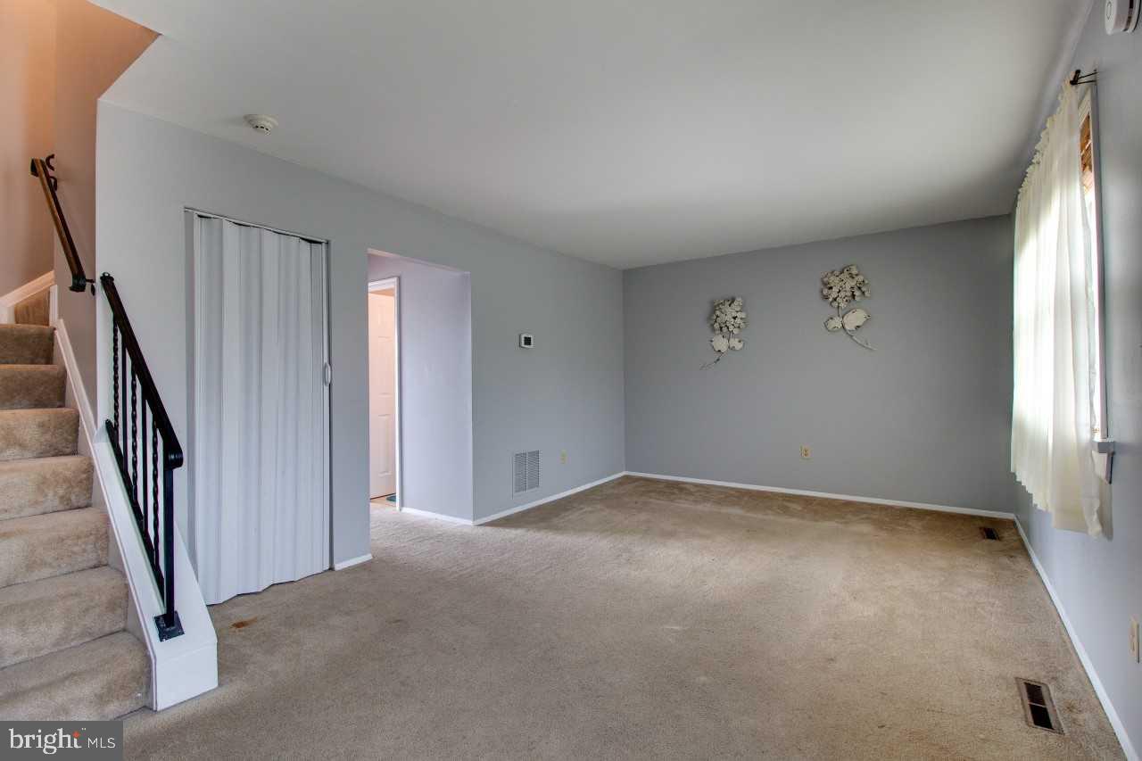 3941 Bayville Road Baltimore, MD 21220 - Photo 5 of 32 an empty room with stairs and stairs