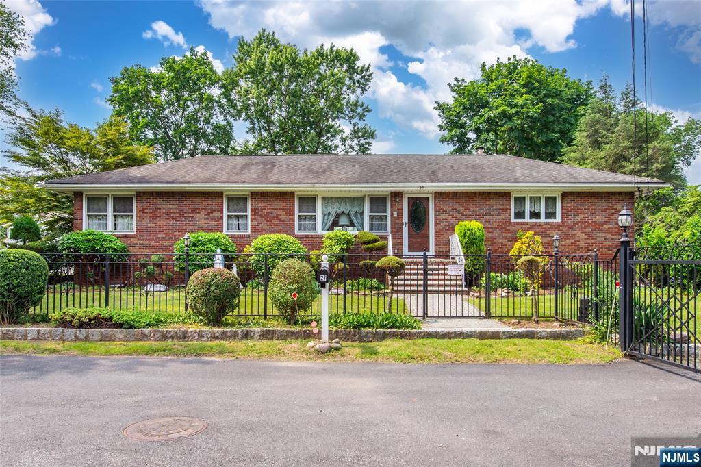 a view of house with a swimming pool