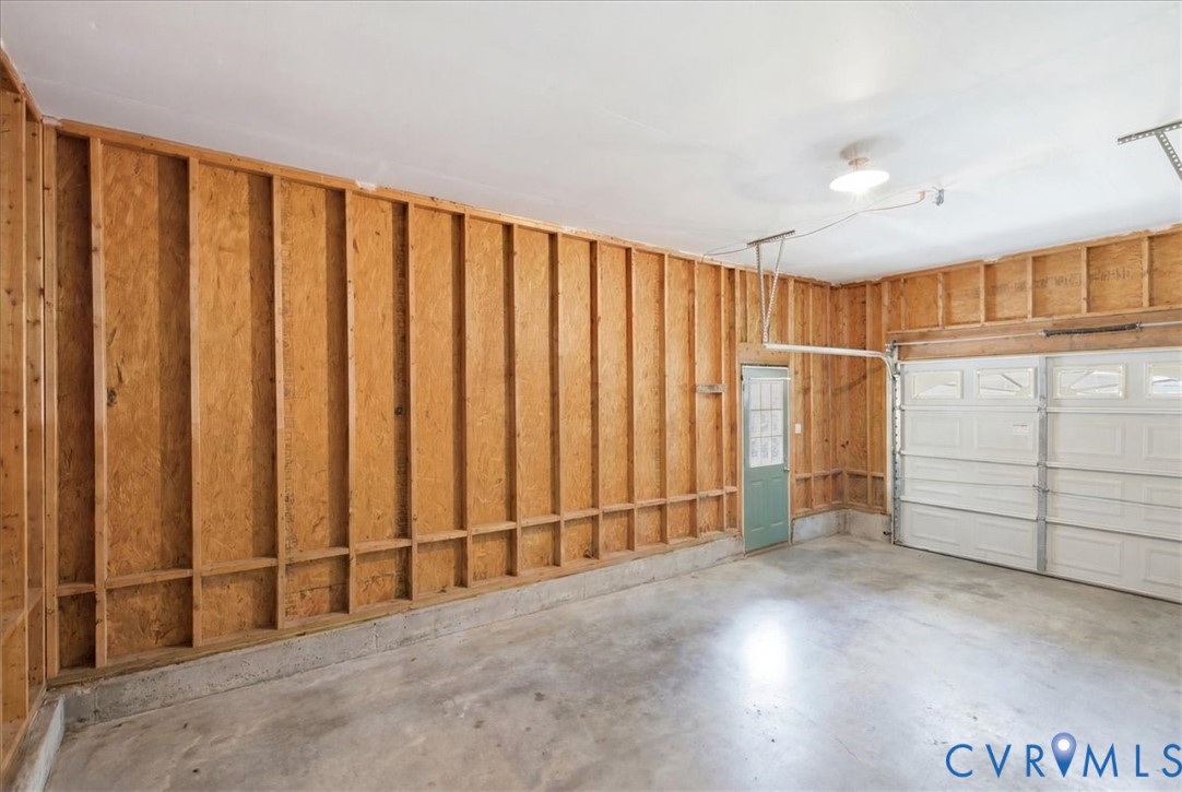 13308 South Chester Road Chester, VA 23831 - Photo 31 of 41 Spacious two-car garage featuring exposed wood-fra