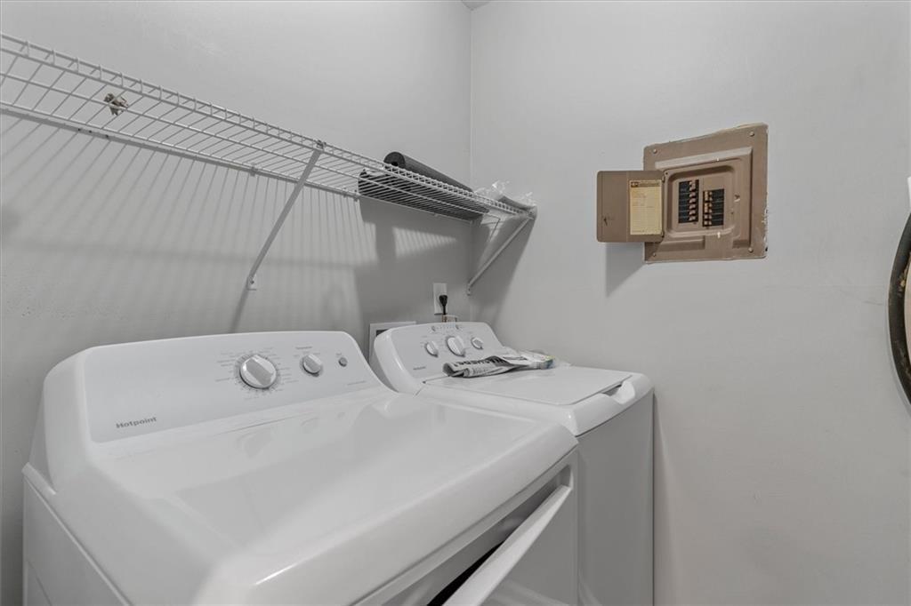 1701 Hawthorne Avenue, Unit 9 Atlanta, GA 30337 - Photo 13 of 16 a utility room with dryer and washer