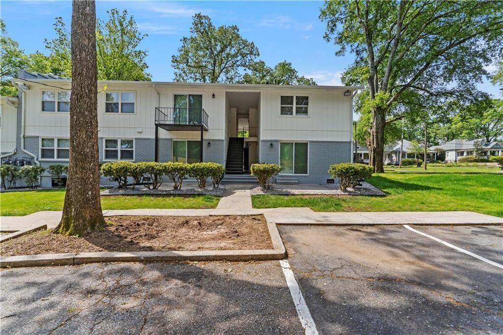 1701 Hawthorne Avenue, Unit 9 Atlanta, GA 30337 - Photo 15 of 16 a view of house with a swimming pool