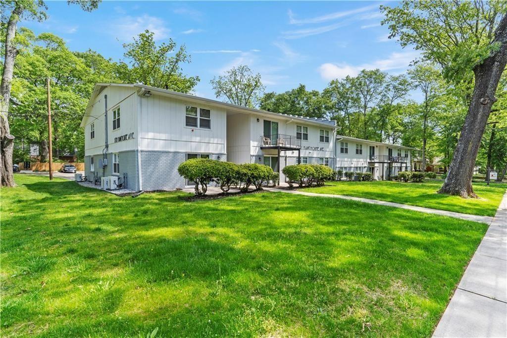 1701 Hawthorne Avenue, Unit 9 Atlanta, GA 30337 - Photo 2 of 16 a view of a house with backyard and garden