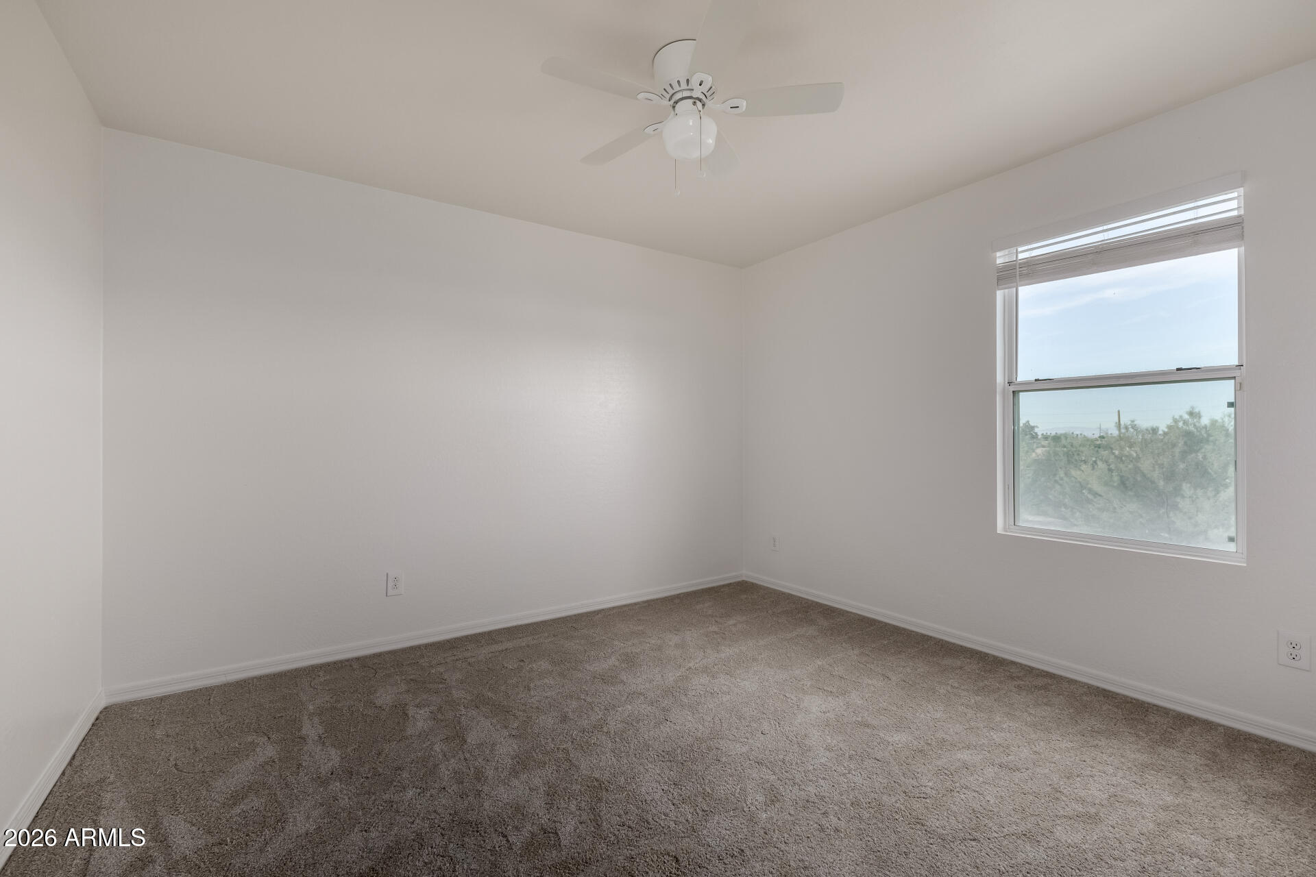 836 Constance Way Phoenix, AZ 85042 - Photo 22 of 51 an empty room with a window