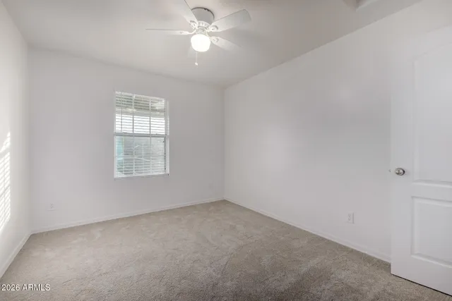 a view of a park with swings and slides