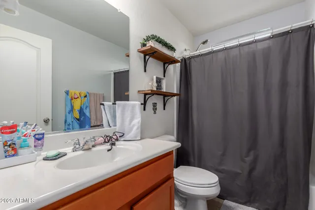 a bed room with furniture and a window