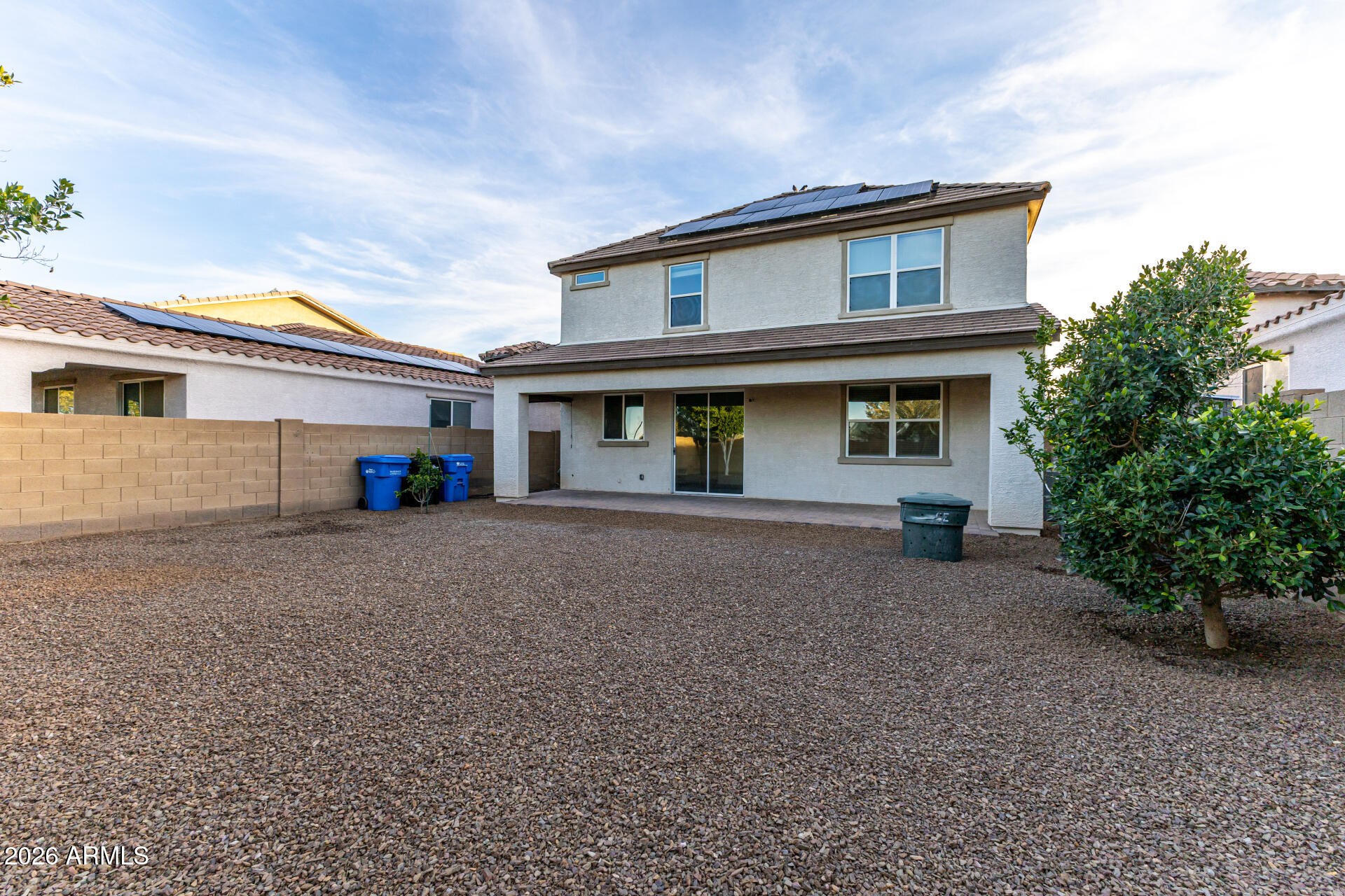 836 Constance Way Phoenix, AZ 85042 - Photo 33 of 51 a view of a house with a backyard and garden