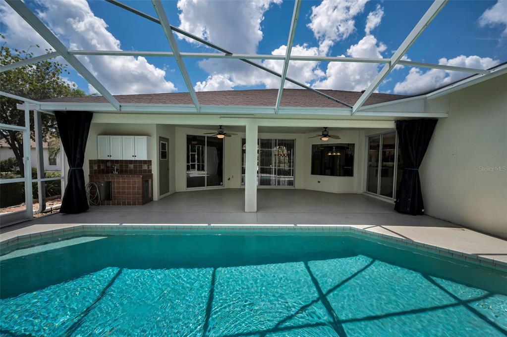 11917 Hadleigh Way Trinity, FL 34655 - Photo 46 of 84 a view of a porch with a patio