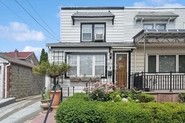 a front view of a house with porch