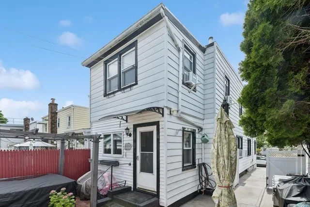a view of a house with a house and sitting area