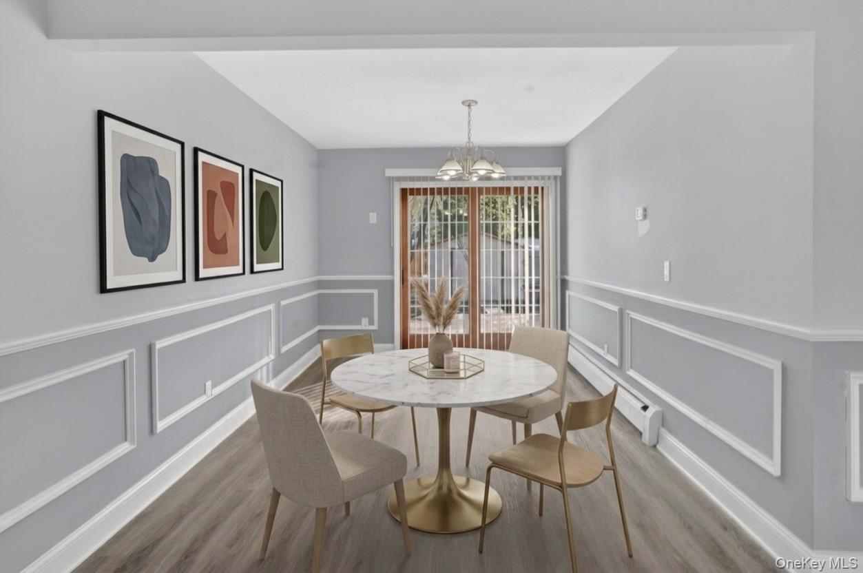 15 North Aspen Road Middletown, NY 10940 - Photo 5 of 16 a view of a dining room with furniture window and wooden floor