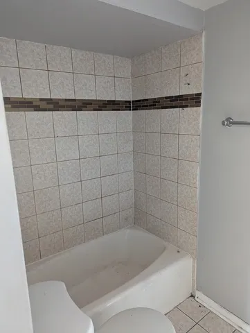 a bathroom with a bathtub