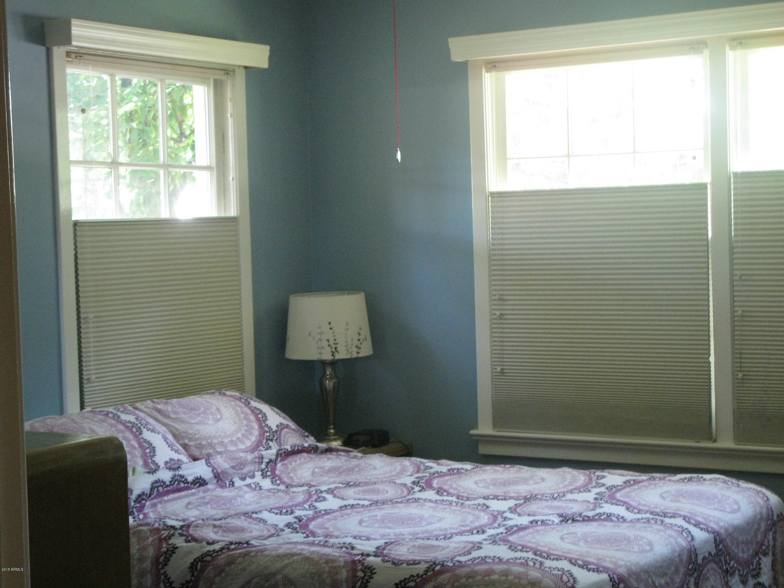 1459 East Flower Street Phoenix, AZ 85014 - Photo 24 of 40 Master bedroom with honeycomb shades