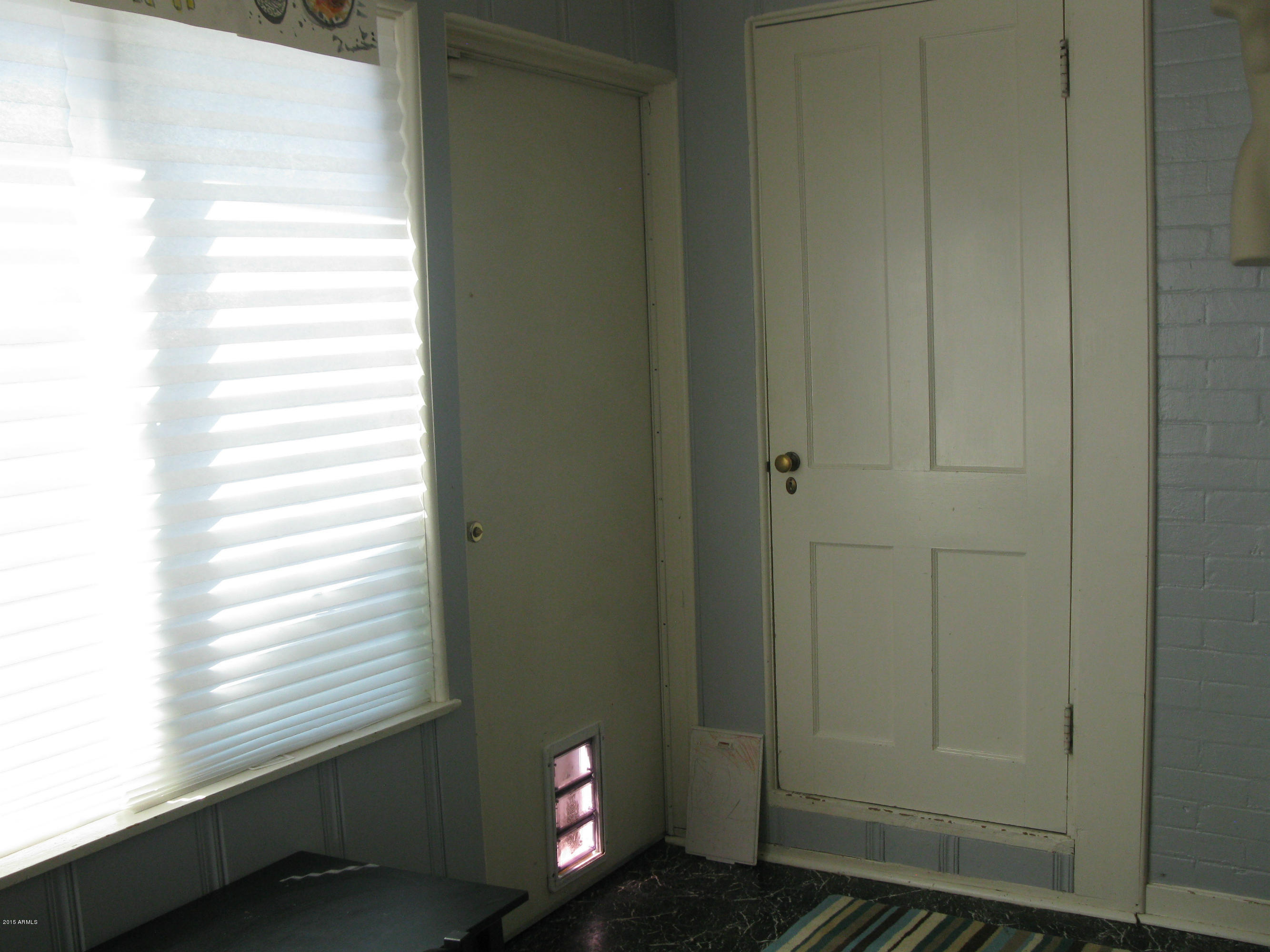 1459 East Flower Street Phoenix, AZ 85014 - Photo 29 of 40 Bedroom 3 has closet & door to backyard