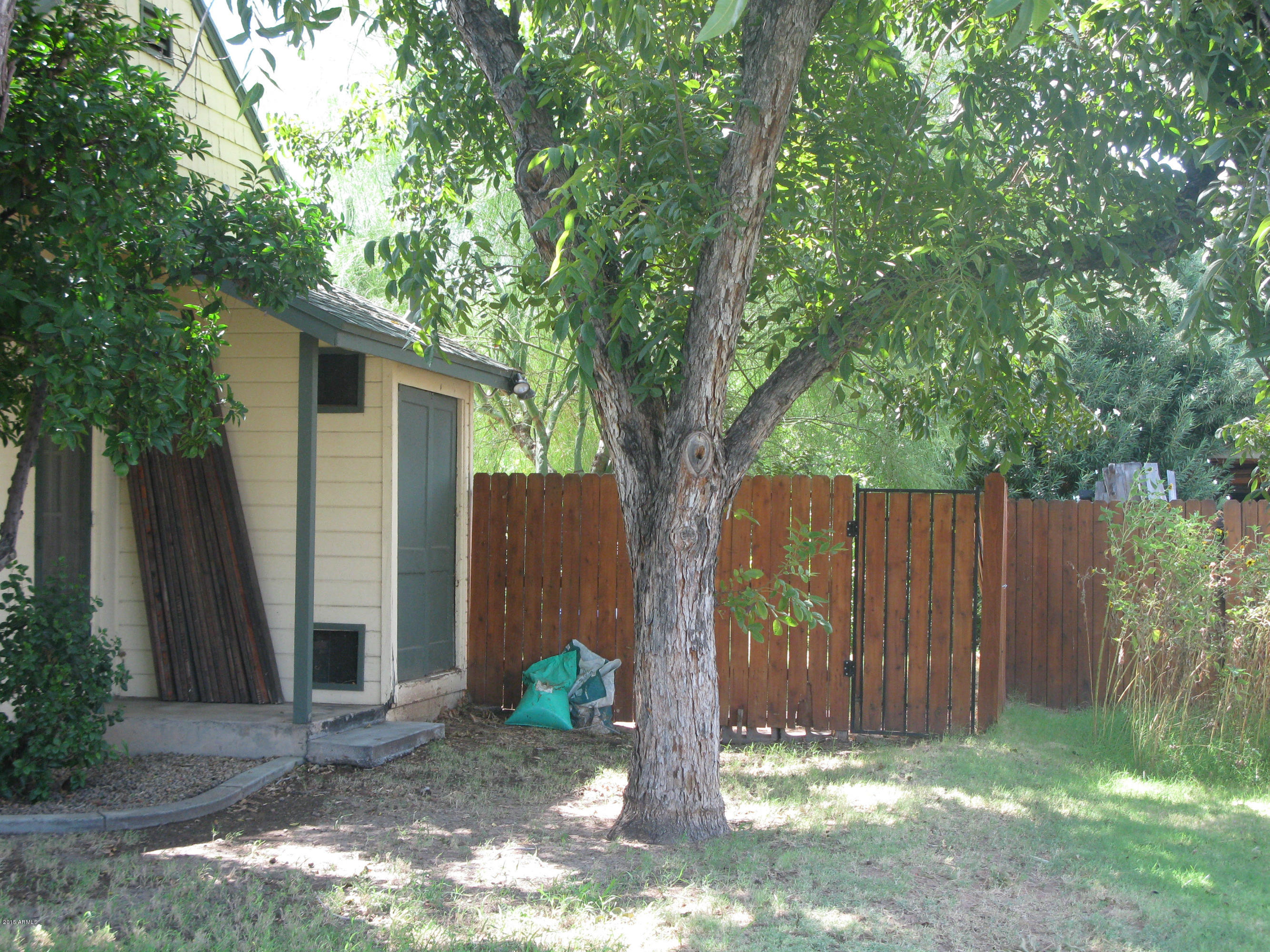 1459 East Flower Street Phoenix, AZ 85014 - Photo 40 of 40 West side showing master entry door