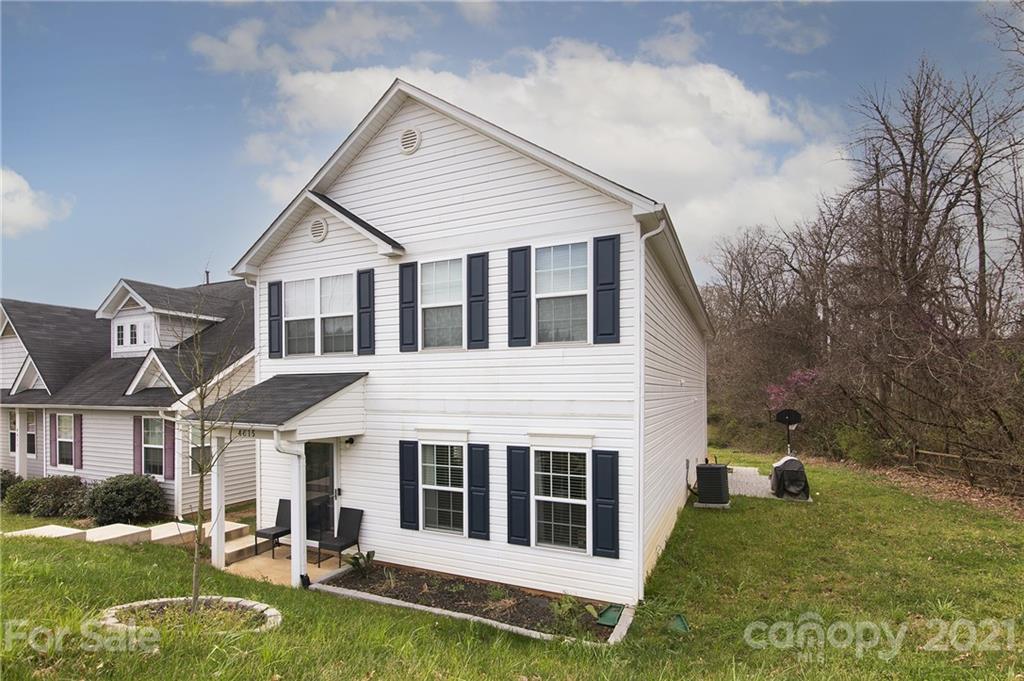 4615 David Cox Road Charlotte, NC 28269 - Photo 2 of 20 a view of a yard in front of house