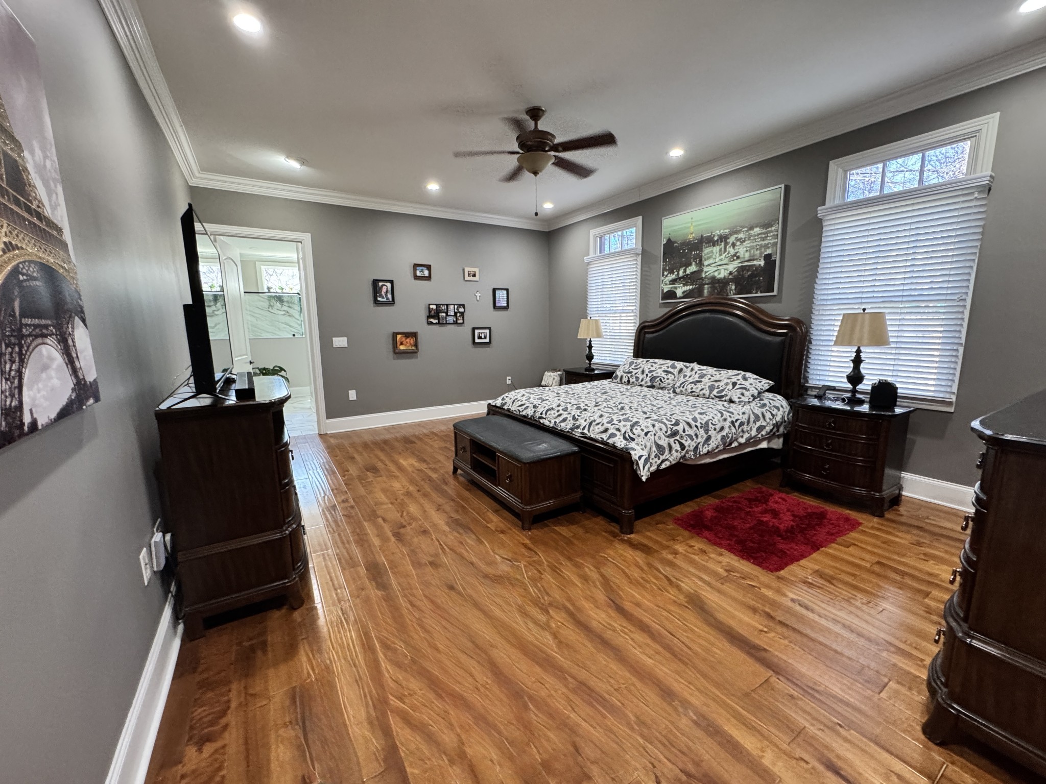 7402 Cold Harbor Court Fairview, TN 37062 - Photo 14 of 48 a bedroom with a bed and wooden floor