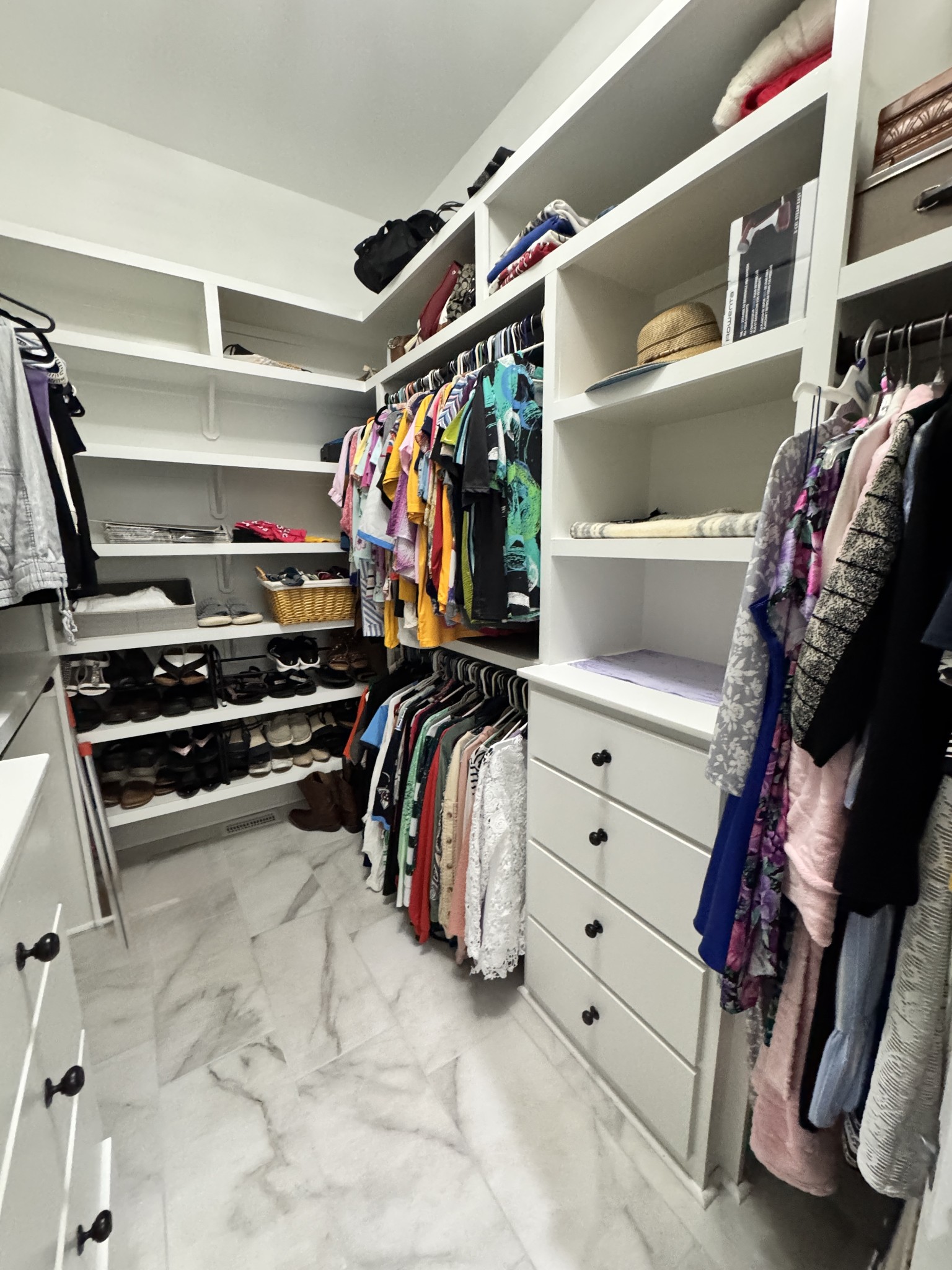 7402 Cold Harbor Court Fairview, TN 37062 - Photo 17 of 48 a view of walk in closet with clothes and shoes