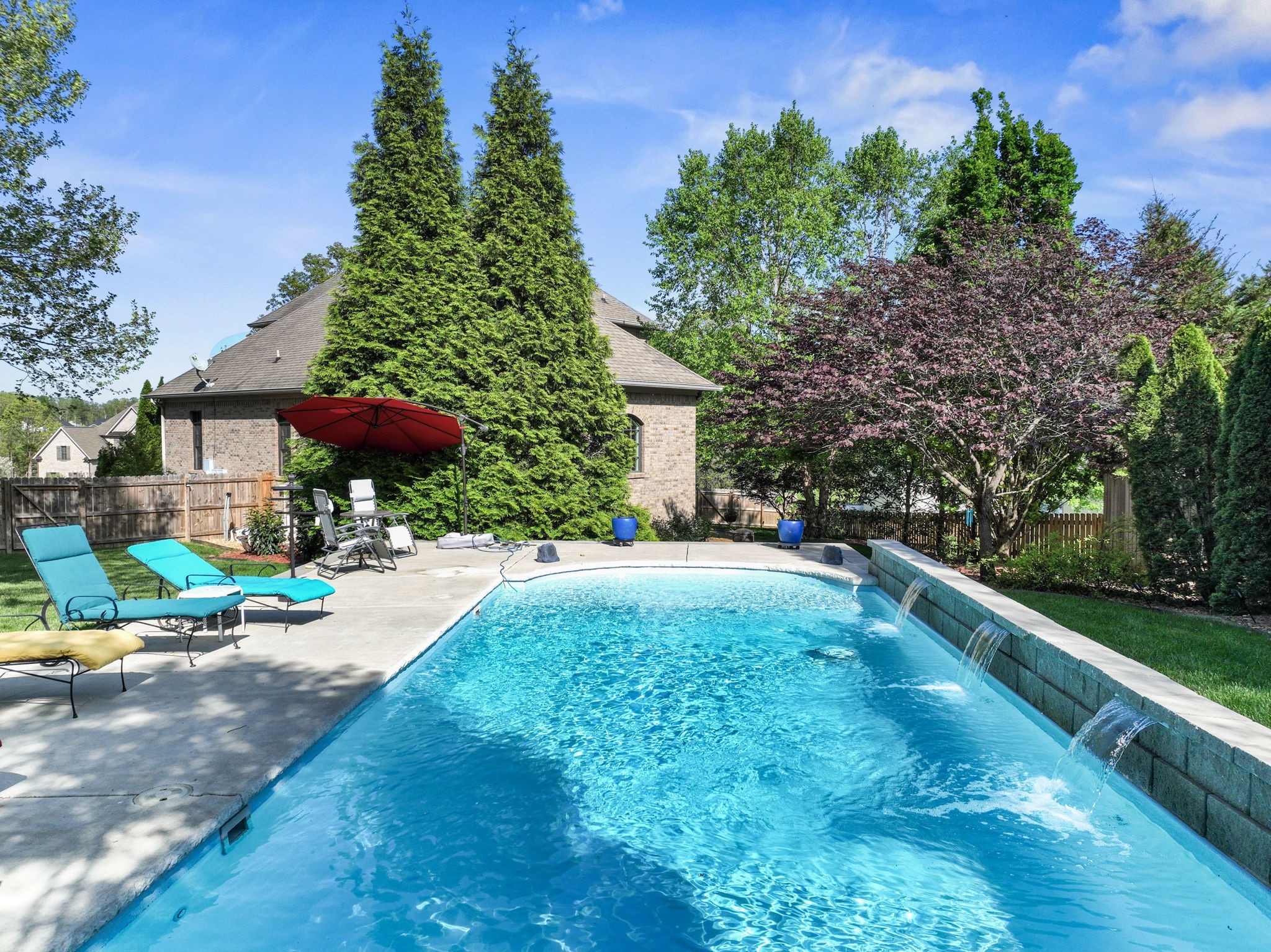 7402 Cold Harbor Court Fairview, TN 37062 - Photo 2 of 48 a view of backyard with outdoor seating and green space